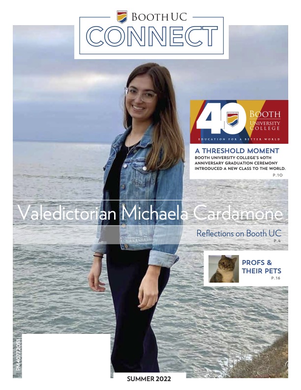 Young woman standing in front of a body of water smiling with text overlay that says "Valedictorian Michaela Cardamone"